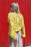 Yellow open-knit crochet top