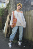 Mustard and berry floral quilted bag