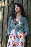 Open knit wrap blouse