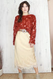 Sequin and feather detail top (Rust)
