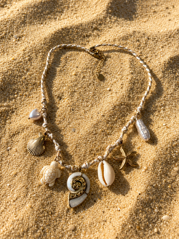 Fossil shell charm woven necklace
