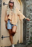 Apricot floral blouse