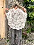 Floral embroidered crochet blouse