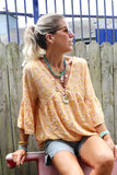 Apricot floral blouse