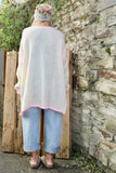 Pink whipstitch and cream cardigan