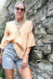 Apricot floral blouse