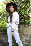 Blue embroidered button down blouse