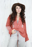 Floral embroidered rust blouse