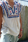 Embroidered frill sleeve blouse