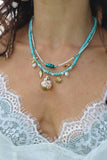 Turquoise stone and white beaded necklace