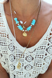 Gold clam shell and blue shell necklace