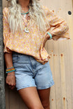 Apricot floral blouse