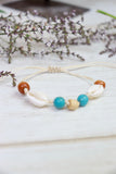 Circular beaded cowrie bracelet