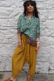 Turquoise border print blouse