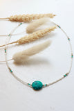 Turquoise stone and white beaded necklace