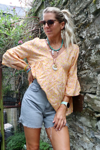 Apricot floral blouse