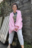 Oversized pink knit cardigan