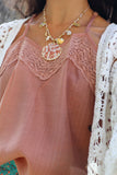 Clam shell and fish necklace