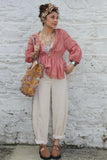 Pom pom detail tiered peach blouse