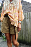 Apricot floral blouse
