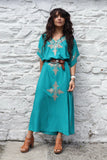 Teal dress with gold embroidery