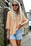 Apricot floral blouse