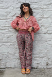 Pink paisley trousers