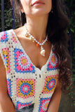 Conch shell charm necklace