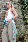 Swell and curl sleeveless tee