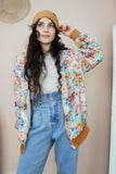 Floral bomber jacket with rust trim