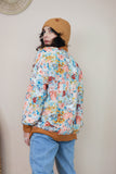 Floral bomber jacket with rust trim