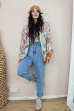 Floral bomber jacket with rust trim