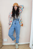 Floral bomber jacket with rust trim